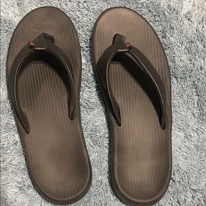 Nike Dark Flip Flops with Subtle Red Detail